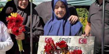 15-temmuz-sehidi-10uncu-yil-donumunde-mezari-basinda-anildi-VUUcBQ75.jpg