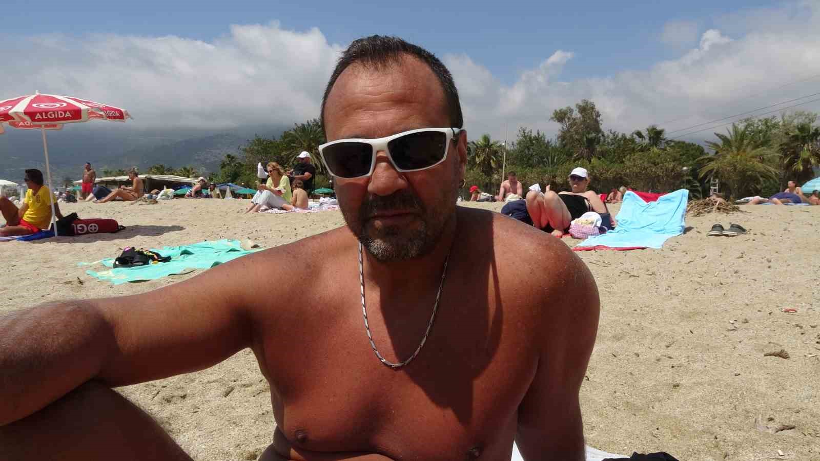 alanyada yaz erken geldi yerli ve yabanci turistler sahile kostu 6 t5JnO6gh