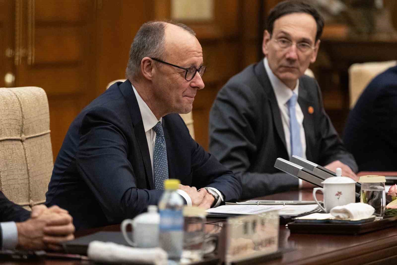 almanya basbakani merz cinli lider xi ile bir araya geldi 6 jeORmpkh