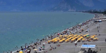 antalya-sahillerinde-bayram-yogunlugu-ikinci-gunde-artarak-devam-etti-kAzkOMD8.jpg