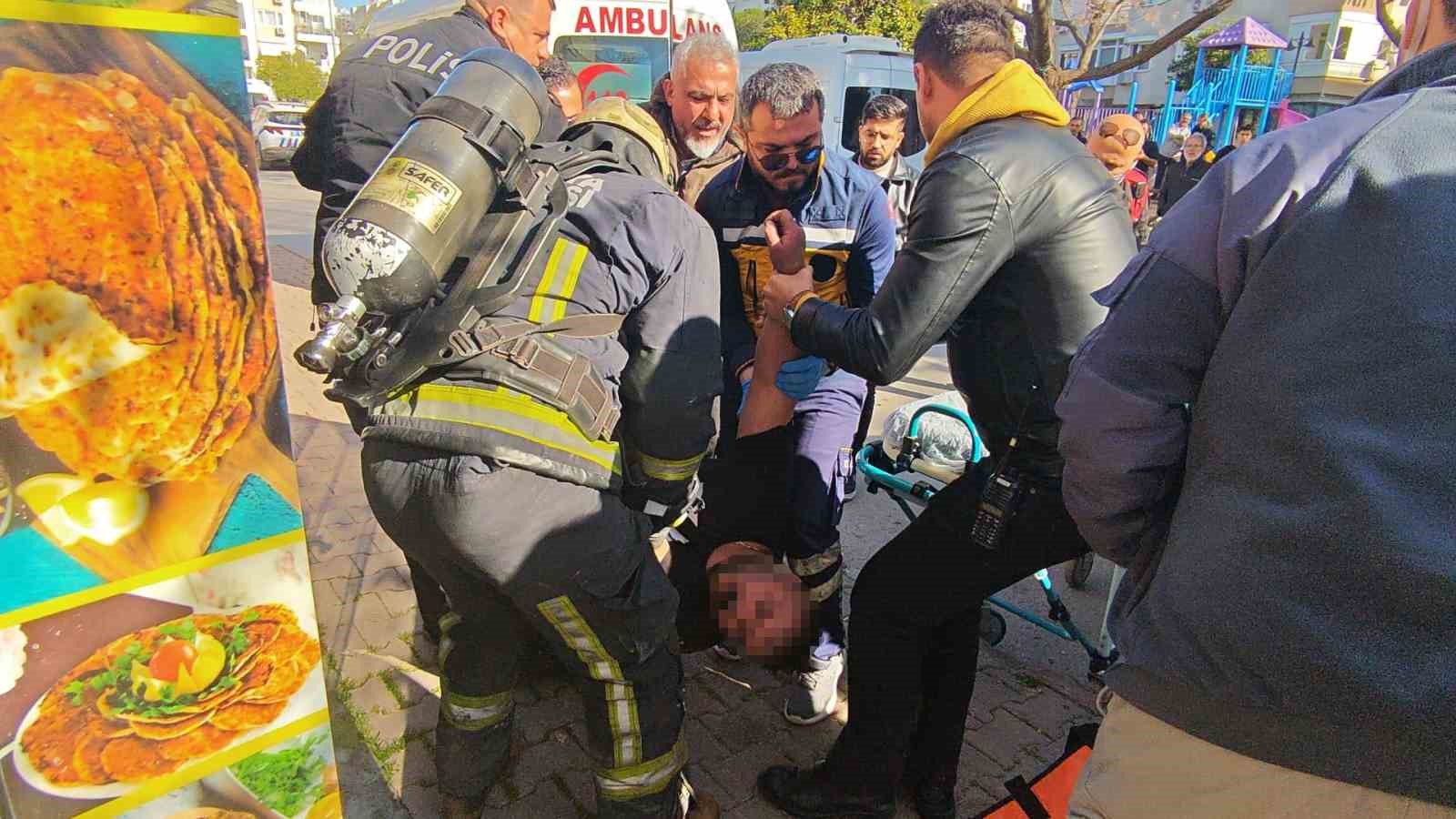 antalyada isyerini kendini kilitleyip yangin cikaran pideci camlari kirip iceriye giren itfaiye ekiplerince baygin