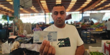askini-paralara-yazip-pazarda-dagitti-WP8Ue2hg.jpg
