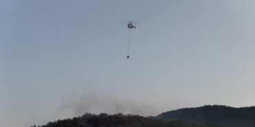 fethiyede-helikopterlerin-yangina-mudahalesi-dron-kamerasinda-sxbQHsIF.jpg