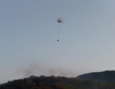 fethiyede-helikopterlerin-yangina-mudahalesi-dron-kamerasinda-sxbQHsIF.jpg