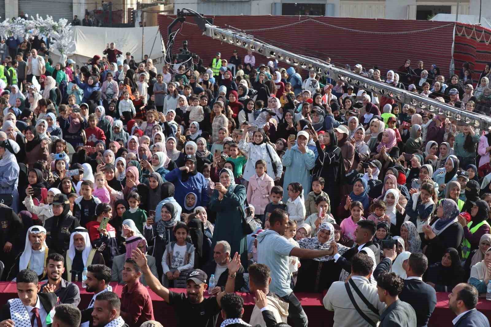 Gazze’de İsrail saldırılarında yakınlarını kaybeden 50 çift için toplu düğün töreni düzenlendi 10 gazzede israil saldirilarinda yakinlarini kaybeden 50 cift icin toplu dugun toreni duzenlendi 6 2BVizNQ3