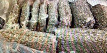 kazakistanda-bagajinda-21-kilo-esrar-tasiyan-kadin-gozaltina-alindi-pUXmhYRA.jpg