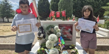 sehit-operatorun-cocukalari-karnelerinin-babalarinin-kabrine-goturdu-2McdZeXw.jpg