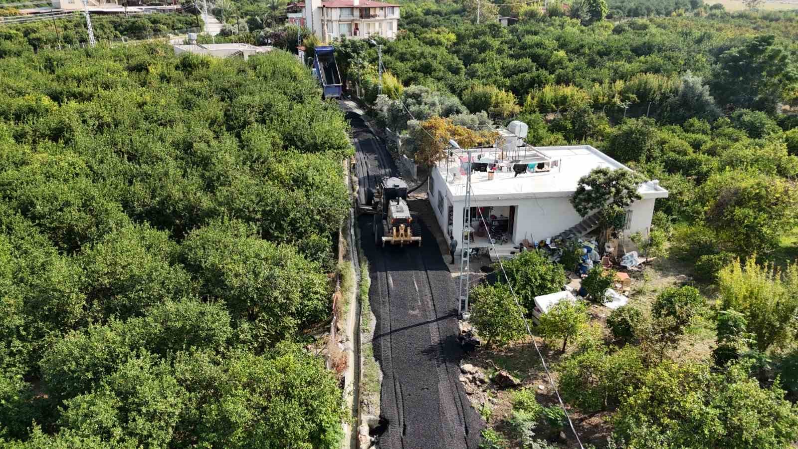 tekerlekli sandalyesiyle rahat gezebilmesi icin sokak asfaltlandi 2 M4TDpJ2E