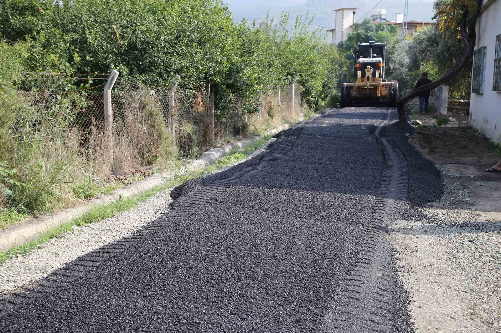 tekerlekli sandalyesiyle rahat gezebilmesi icin sokak asfaltlandi 3 kdBkizas